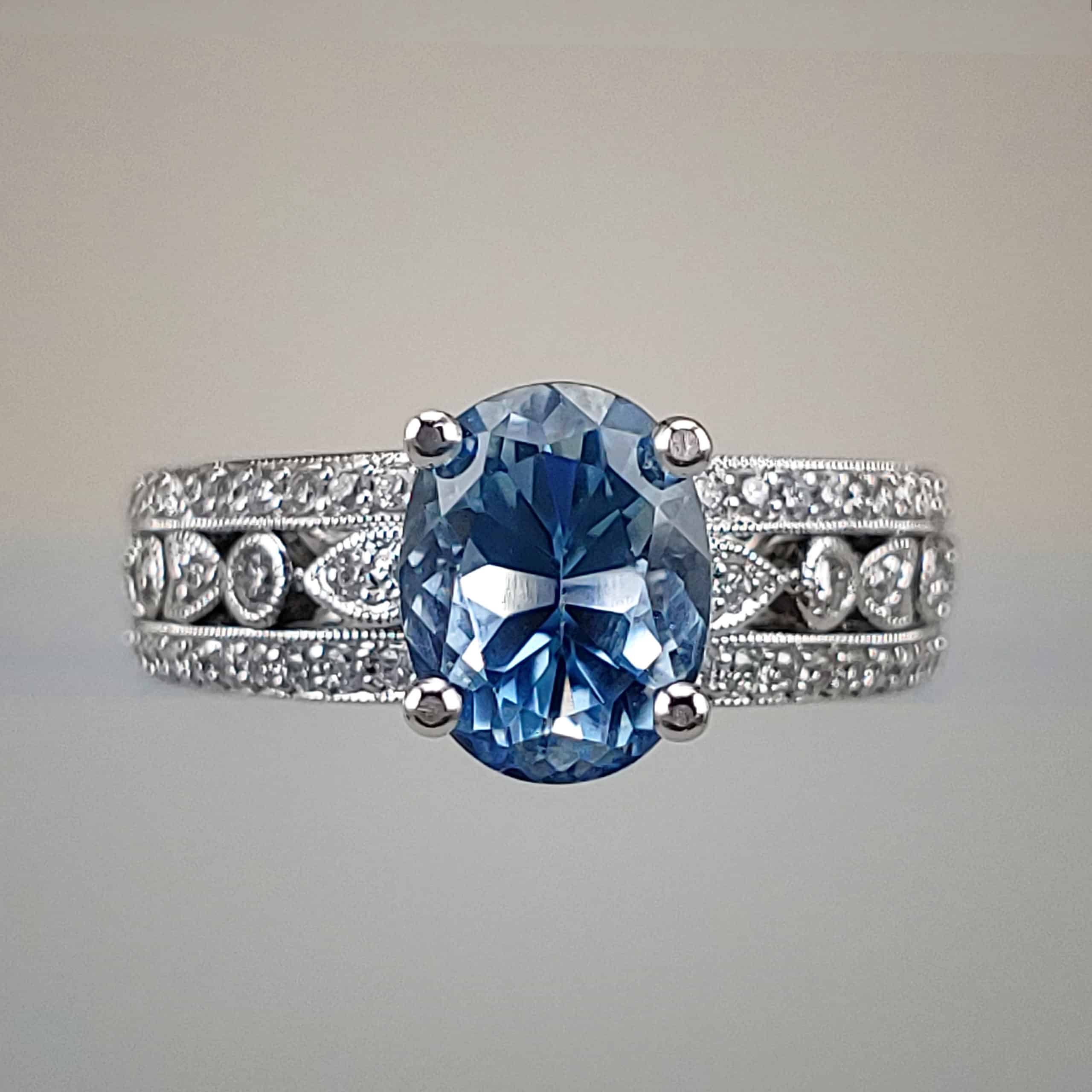 Oval-Cut Blue Topaz w White Gold Filigree Diamond Shank
