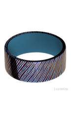 9 mm wide Flat Titanium Damascus band featuring a Royal Blue sleeve.
