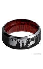 9 mm wide/High Bevel/Tantalum band with a laser carved Bear Moose Deer Mountain pattern also featuring a Blood Wood sleeve.