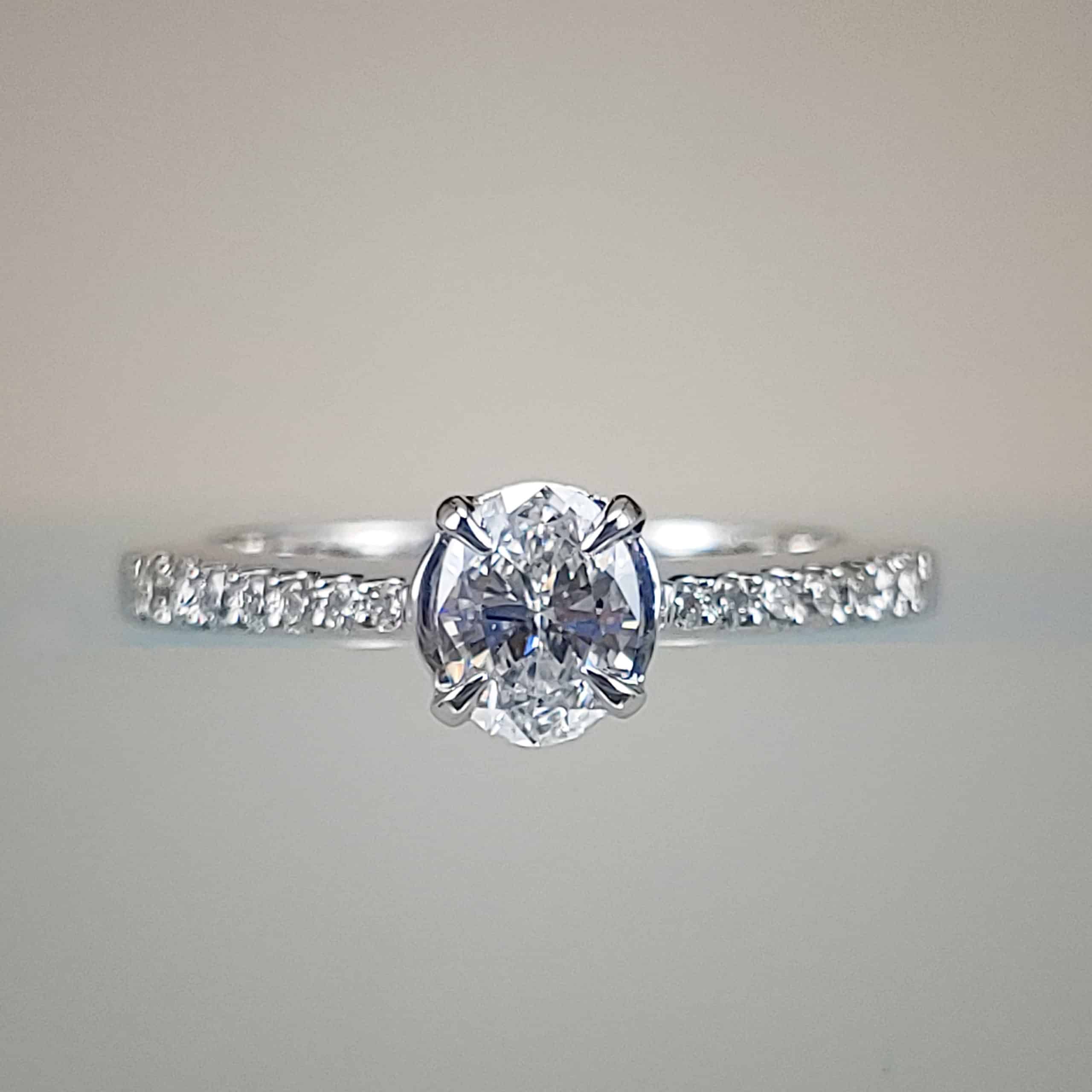 VS2 1/2 Carat Oval Diamond Center Stone Engagement Ring w Prong Set Diamond Shank