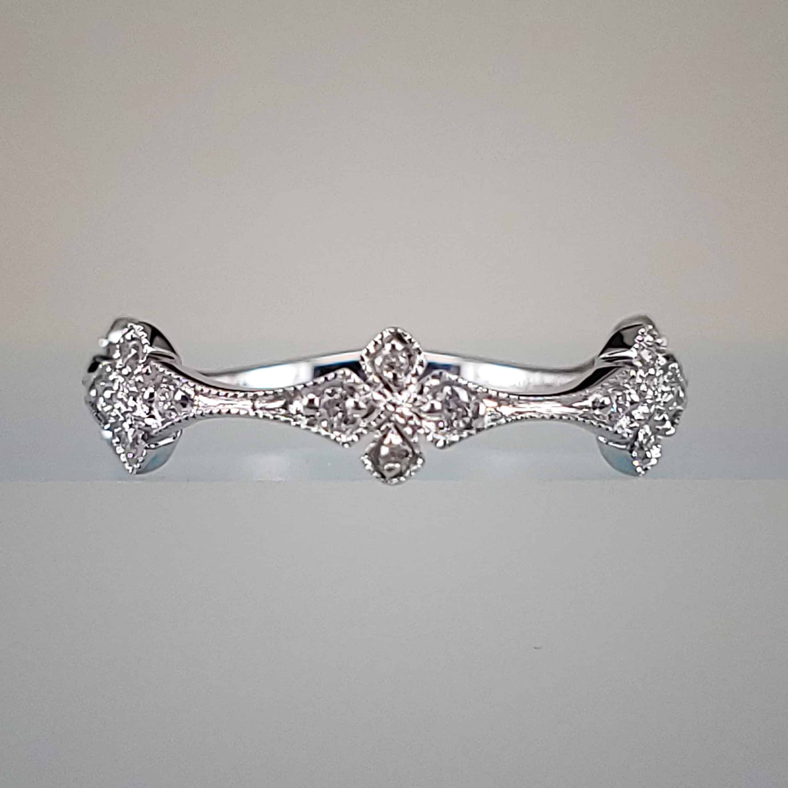 18K White Gold Triple Round-Set Diamond Ring with Filigree Halo Accent