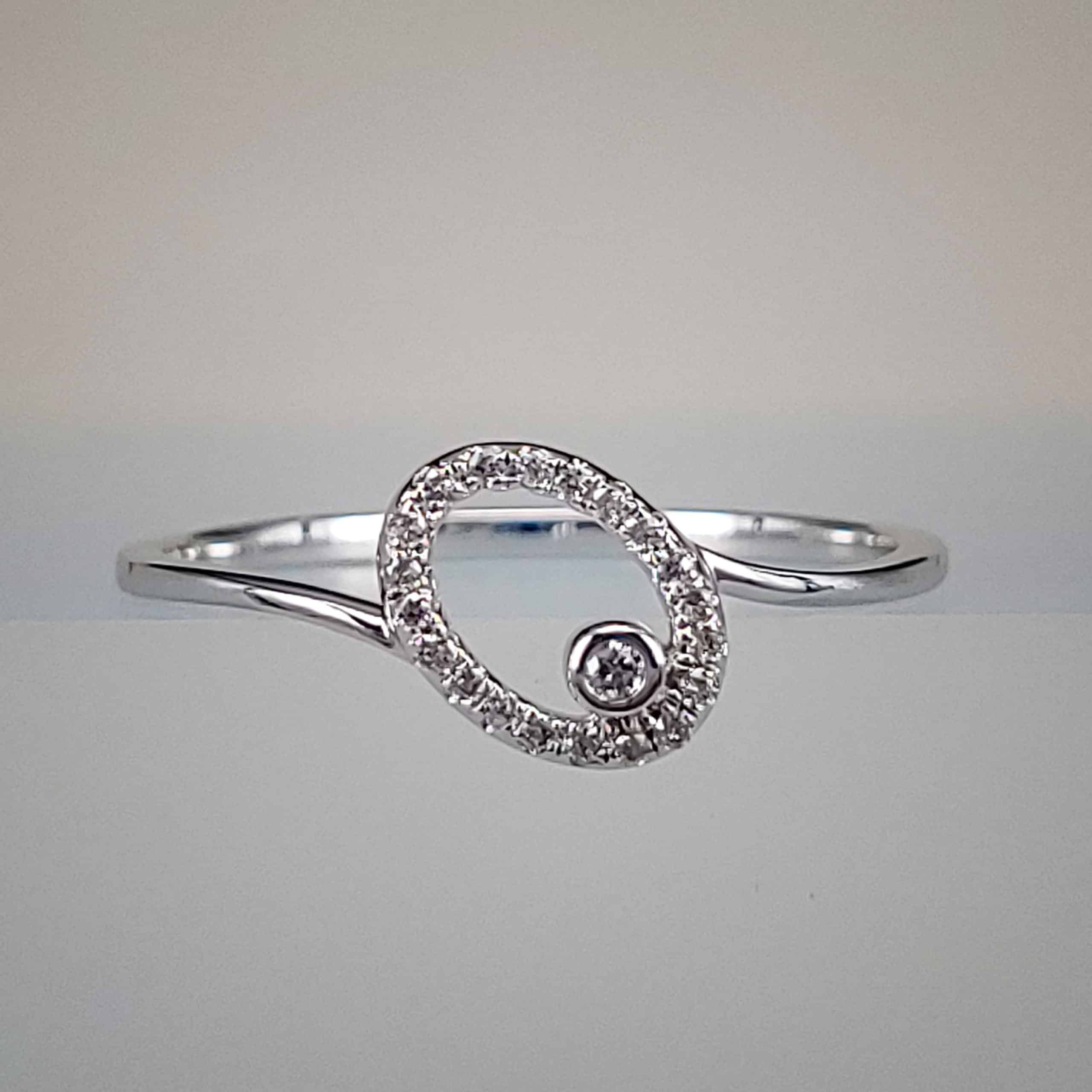 10K White Gold Oval Diamond with Bezel Set Round Diamond Center
