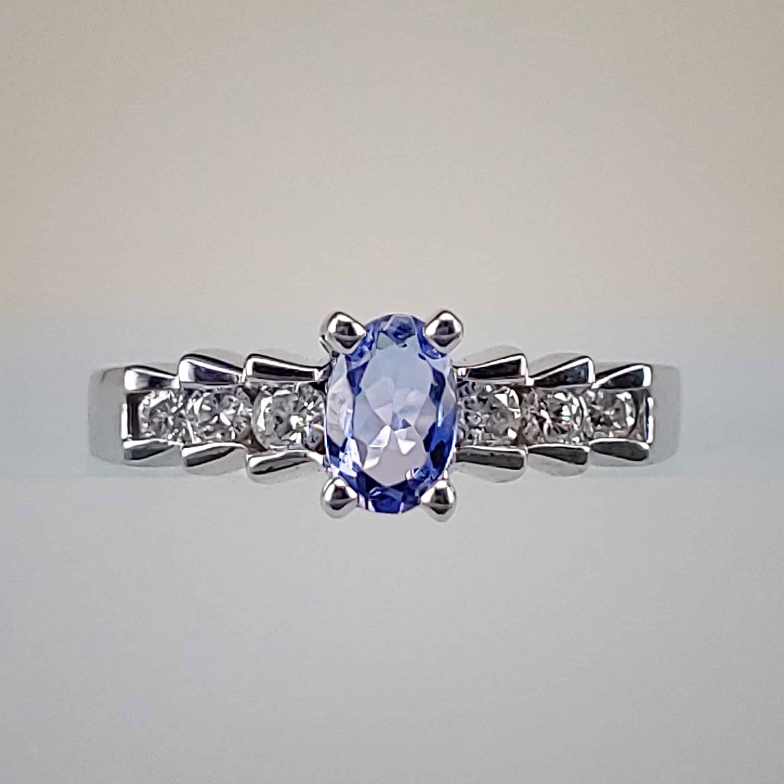 Oval-Cut Tanzanite w Bar-Set Diamond Shank in White Gold